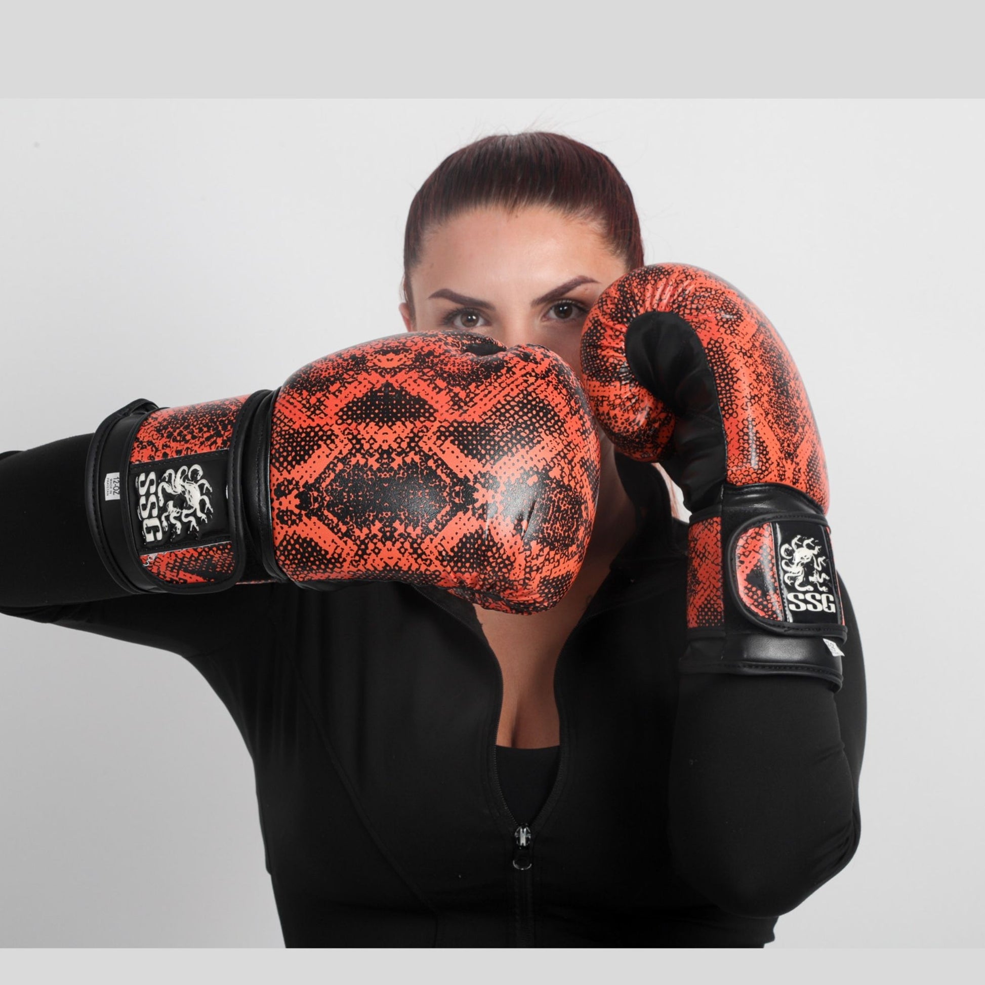 Ignite your training with Smoldering Curse boxing gloves. Bold red-black design, superior wrist support & pro performance for sparring and bag work.\