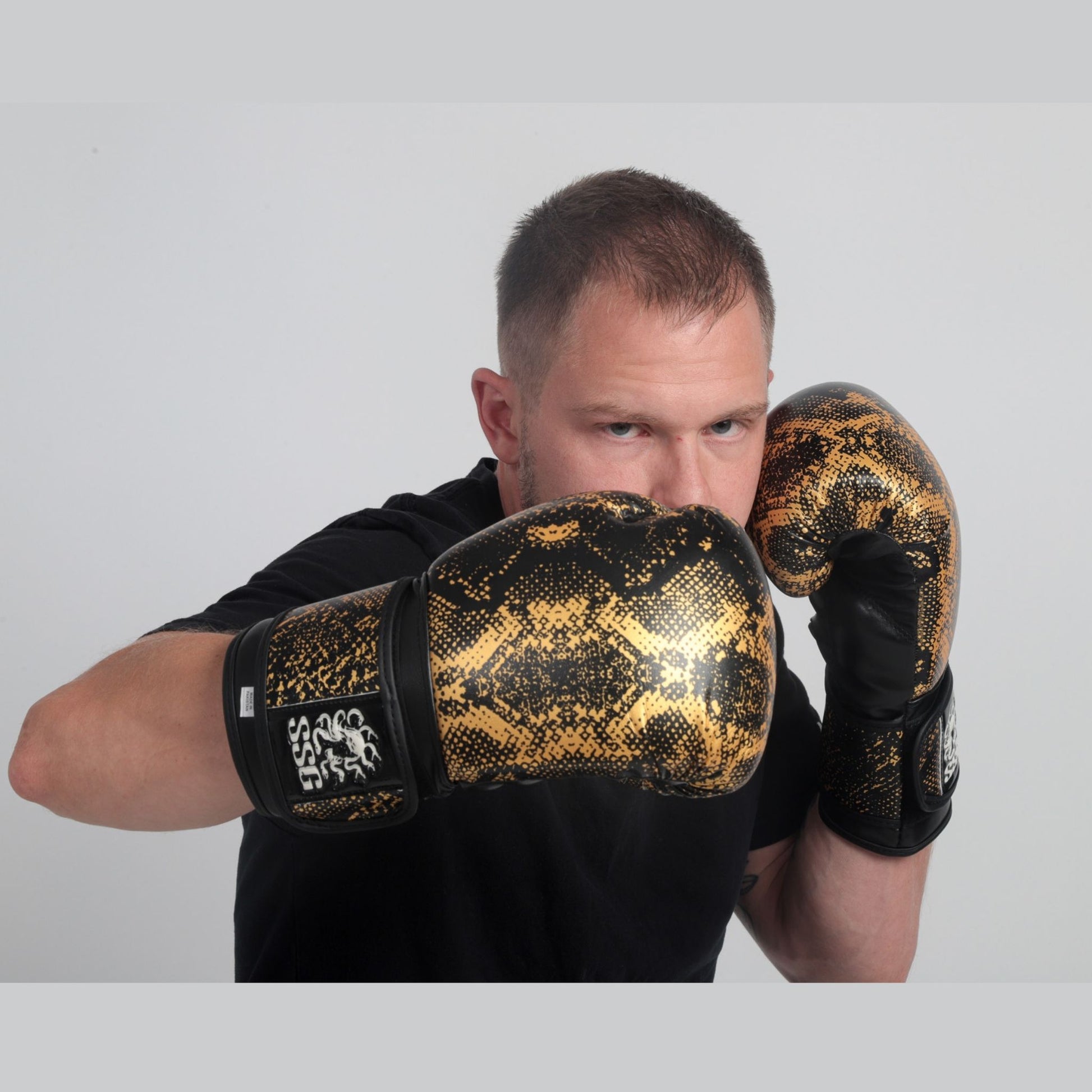 Midnight Strike black boxing gloves by StoneStrike – premium training gloves with wrist support