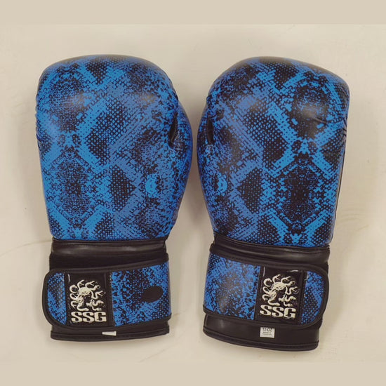 Product video showing close-up and angles of Medusa’s Blue Gaze boxing gloves